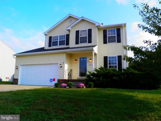 5919 Plata Street Clinton, MD 20735 - Photo 25 of 25 a front view of house with yard and green space