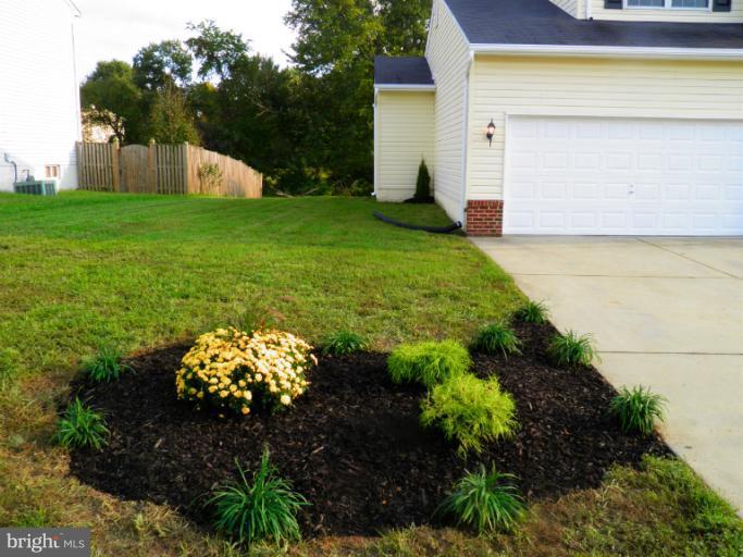 5919 Plata Street Clinton, MD 20735 - Photo 7 of 25 a view of a back yard of the house