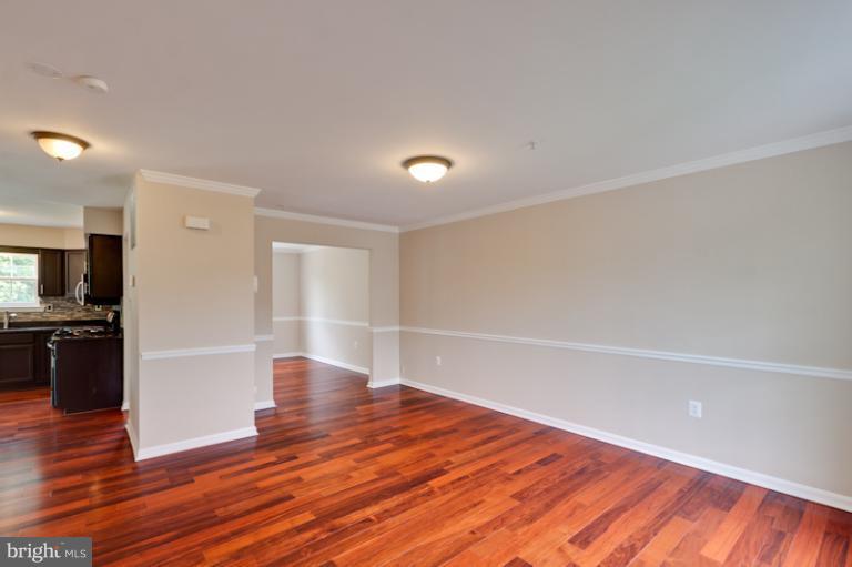 5919 Plata Street Clinton, MD 20735 - Photo 8 of 25 a view of empty room with wooden floor