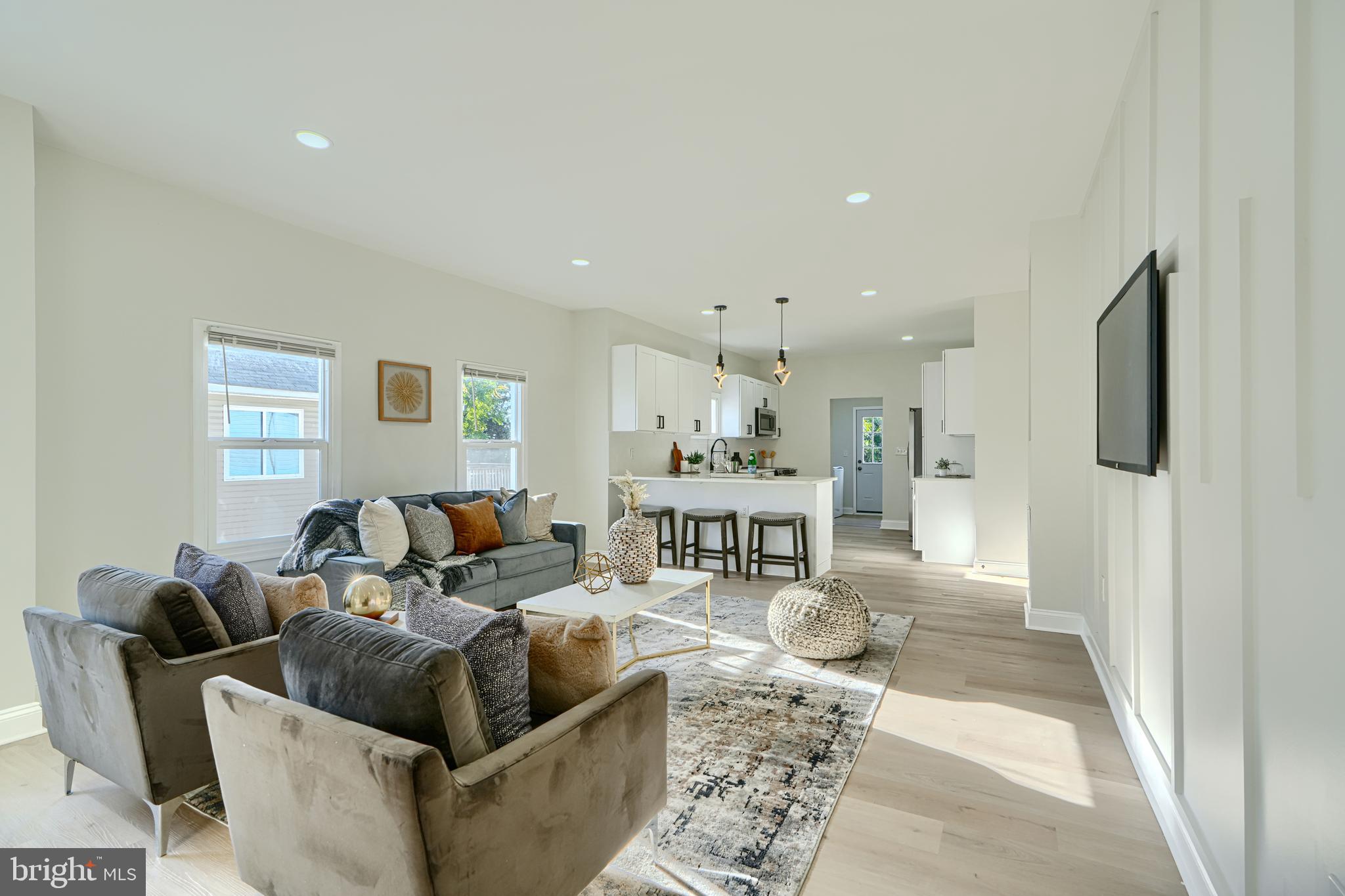 2126 Oakland Road Baltimore, MD 21220 - Photo 13 of 53 a living room with furniture and a table