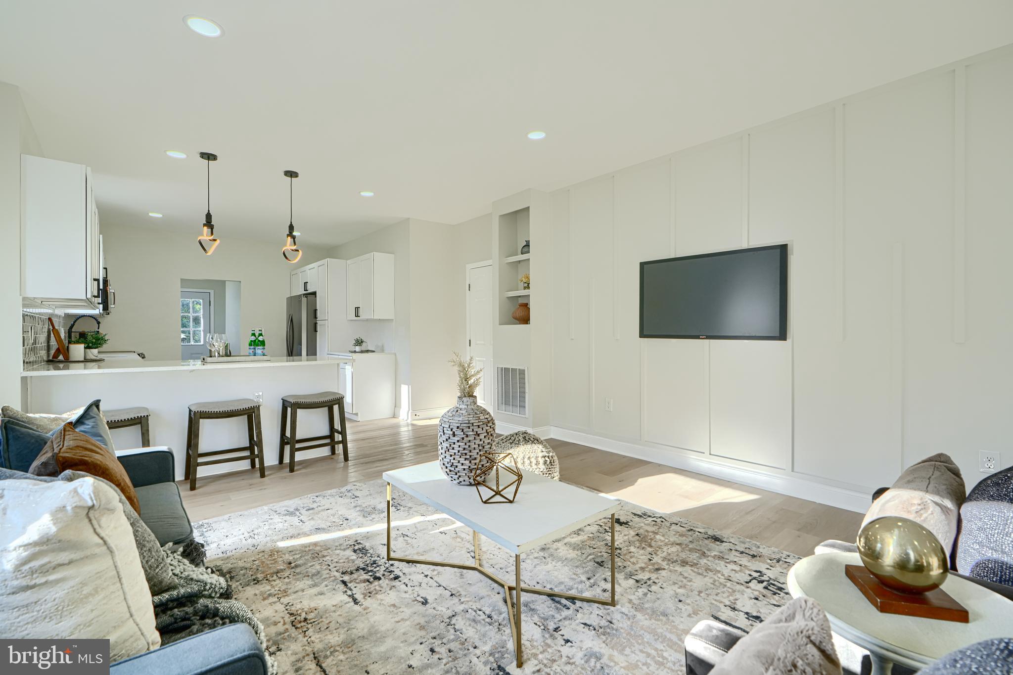 2126 Oakland Road Baltimore, MD 21220 - Photo 14 of 53 a living room with furniture and kitchen view