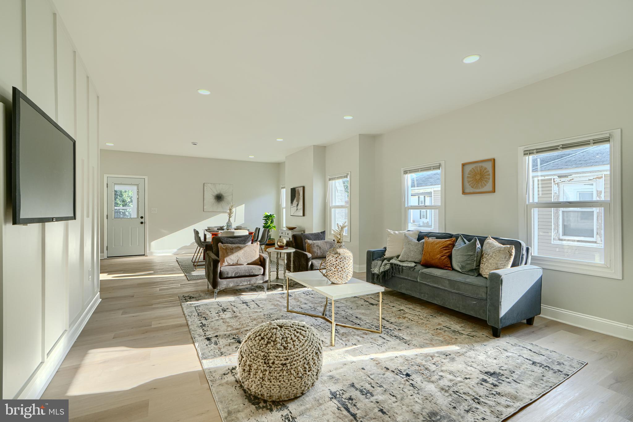 2126 Oakland Road Baltimore, MD 21220 - Photo 17 of 53 a living room with furniture and a flat screen tv