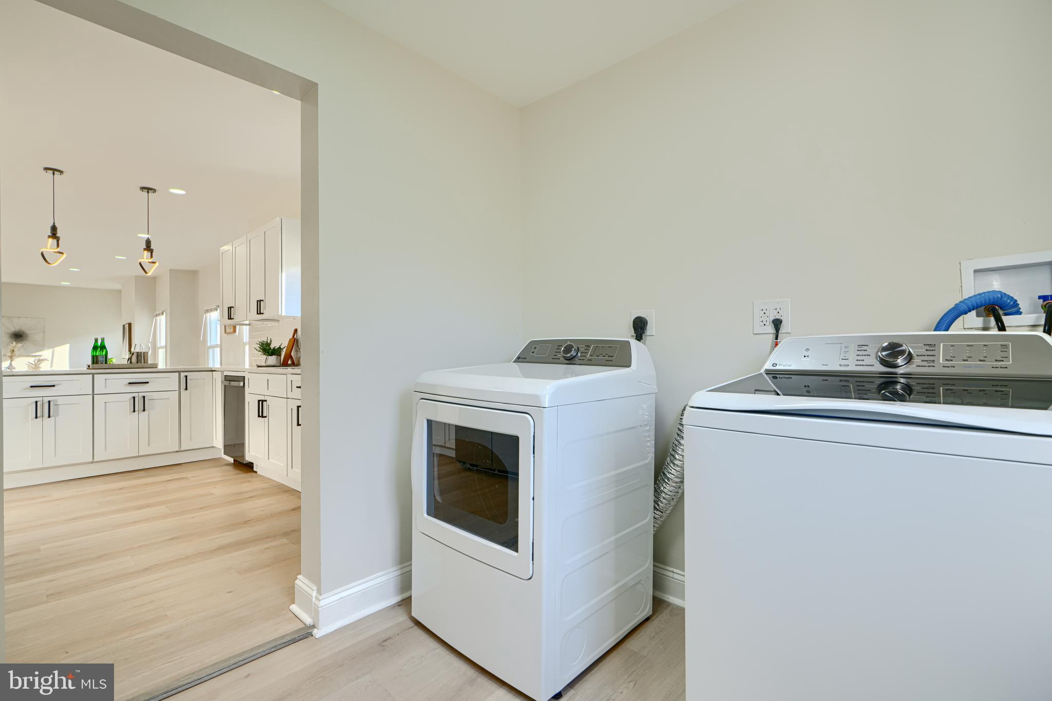 2126 Oakland Road Baltimore, MD 21220 - Photo 25 of 53 a kitchen with a stove and a microwave