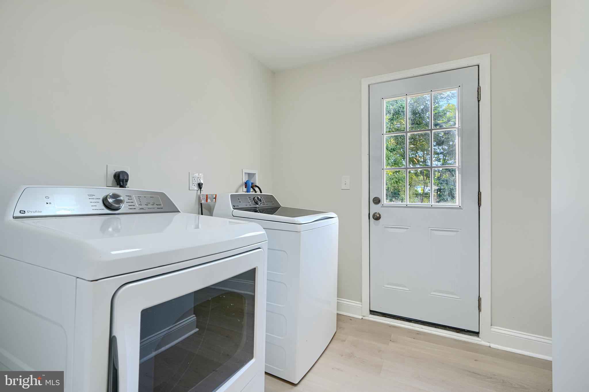2126 Oakland Road Baltimore, MD 21220 - Photo 26 of 53 a utility room with dryer and washer