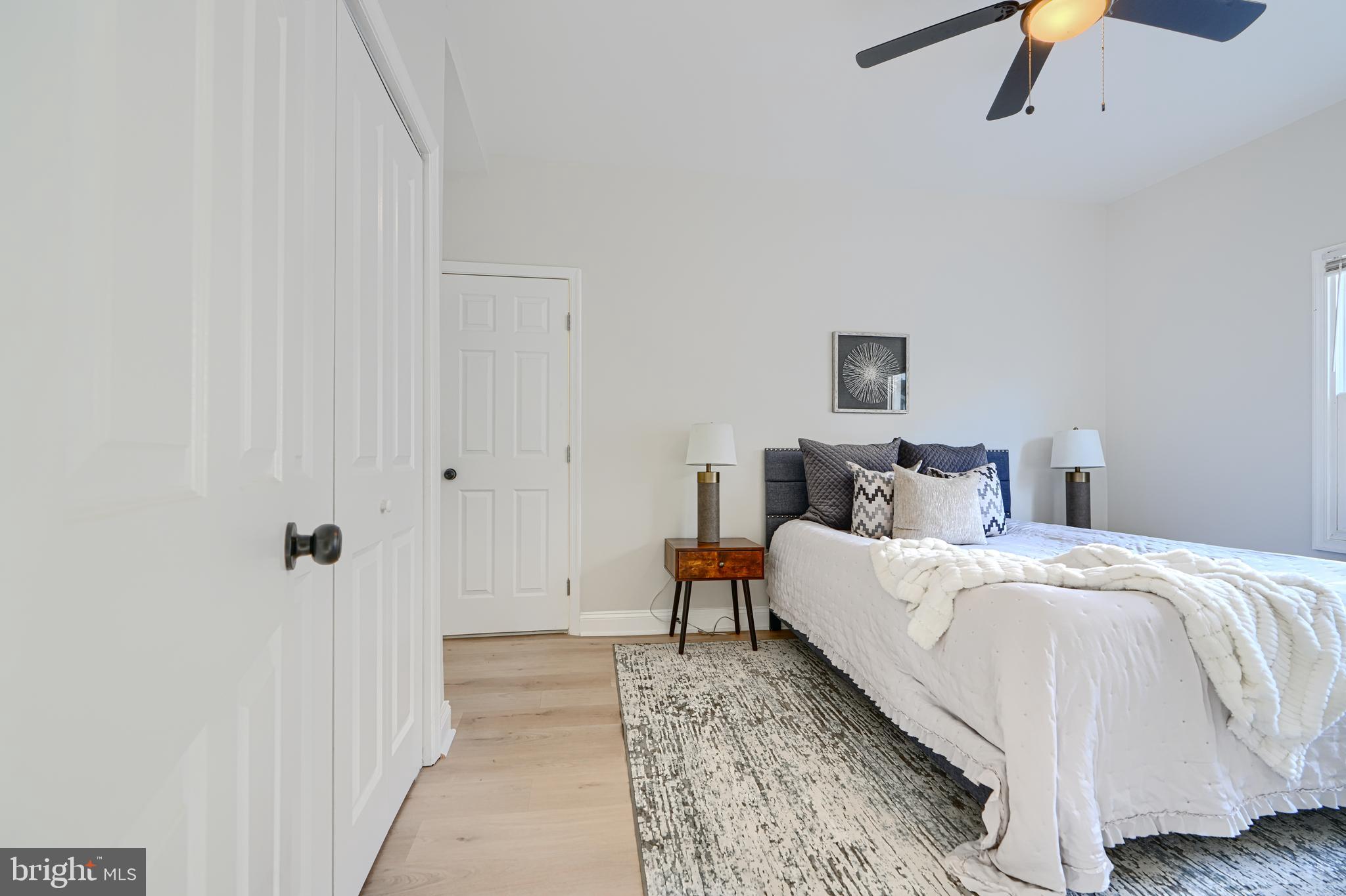 2126 Oakland Road Baltimore, MD 21220 - Photo 29 of 53 a bed room with a bed and a chair