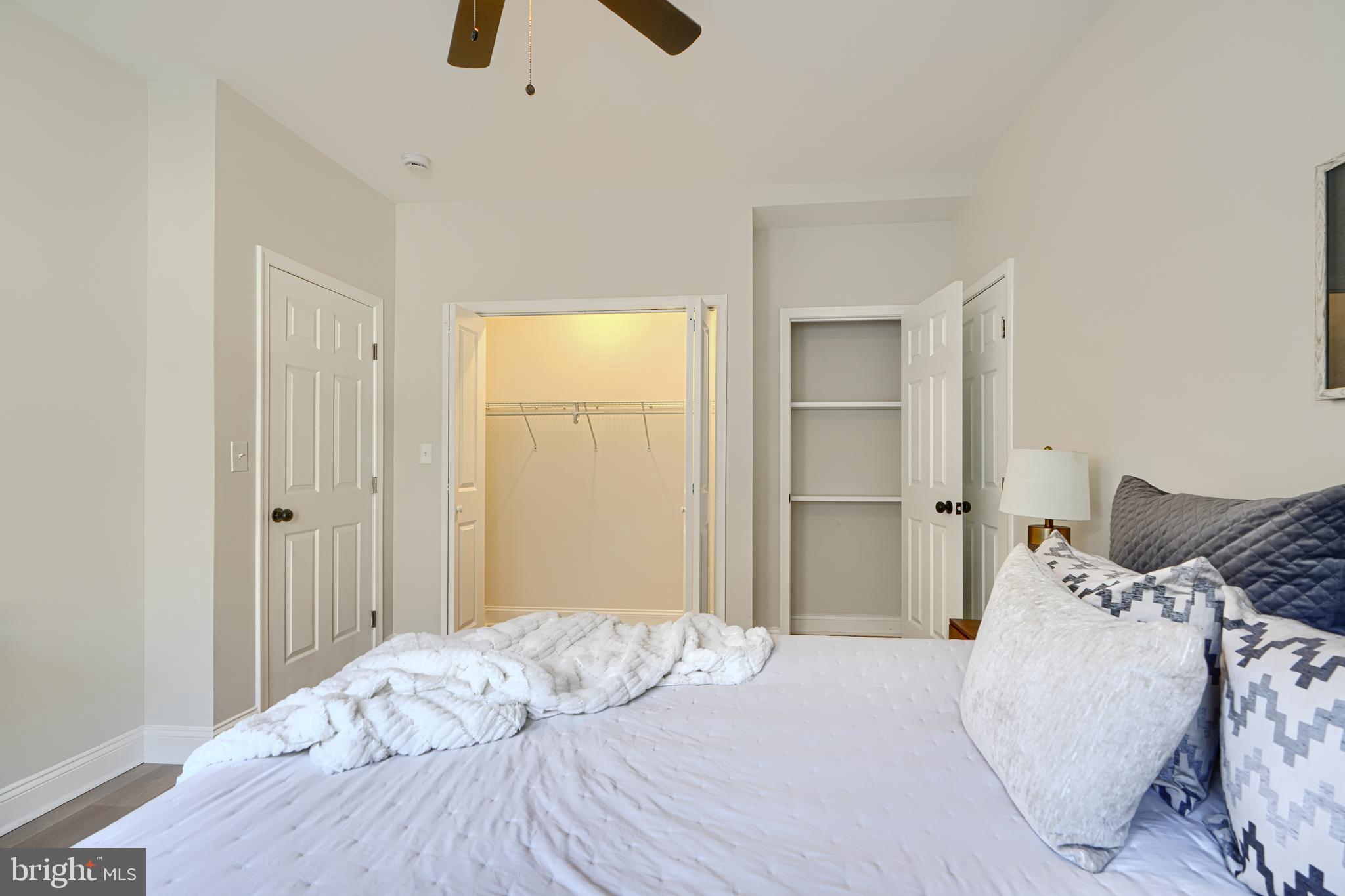 2126 Oakland Road Baltimore, MD 21220 - Photo 30 of 53 a bedroom with a bed and cabinets