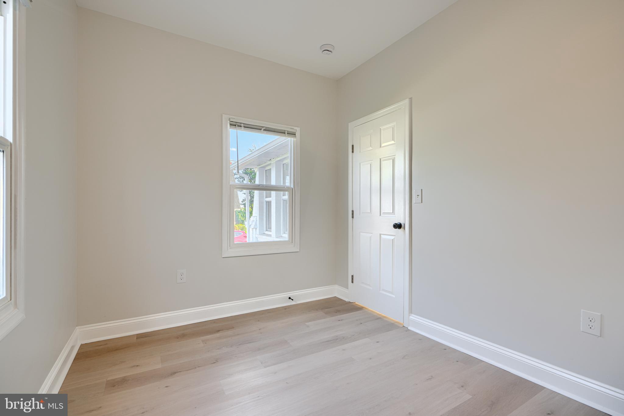 2126 Oakland Road Baltimore, MD 21220 - Photo 36 of 53 an empty room with windows and closet