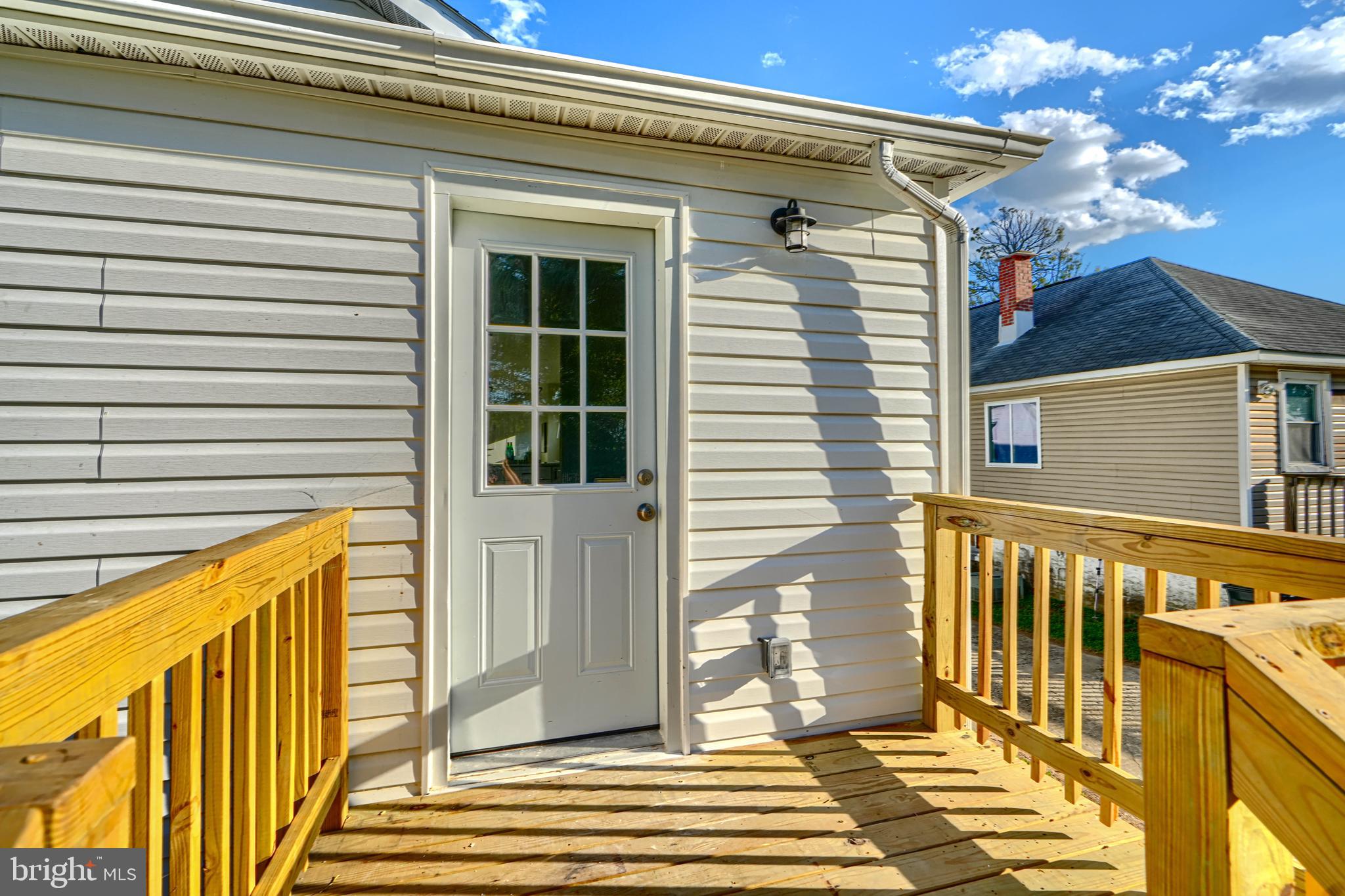 2126 Oakland Road Baltimore, MD 21220 - Photo 48 of 53 a view of a balcony with wooden floor