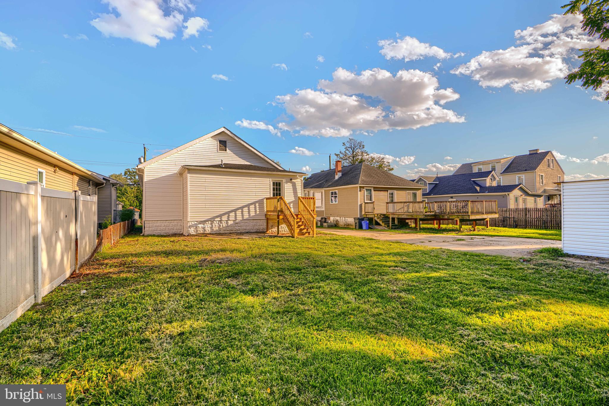 2126 Oakland Road Baltimore, MD 21220 - Photo 50 of 53 a view of a house with a big yard