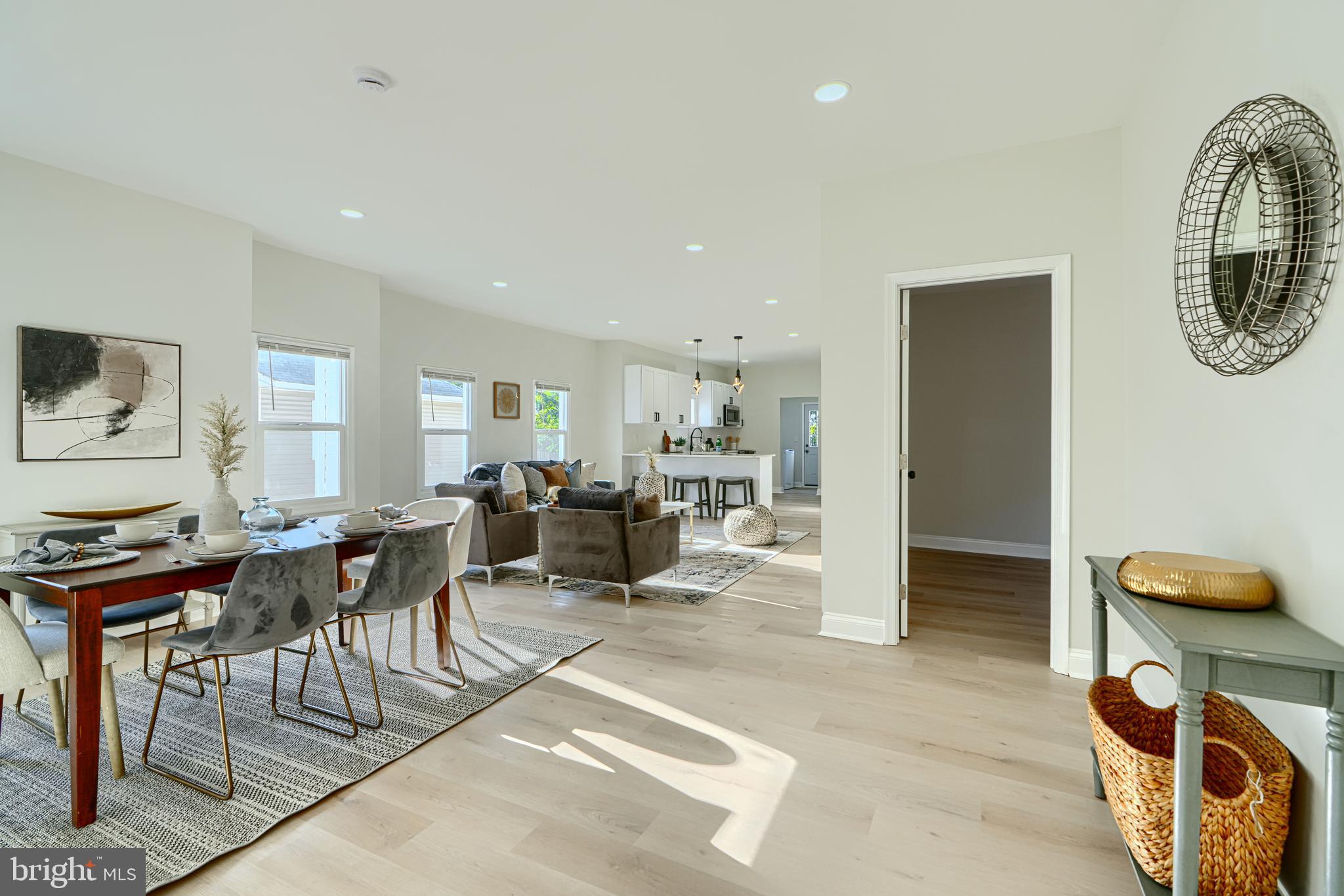 2126 Oakland Road Baltimore, MD 21220 - Photo 9 of 53 a living room with furniture a rug and a flat screen tv