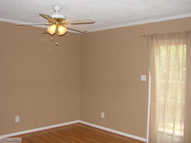 5701 M Bramblegate Road Greensboro, NC 27409 - Photo 5 of 9 Dining Room. Dining Area or Breakfast room with access to your private fenced patio through french doors.