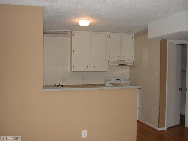 5701 M Bramblegate Road Greensboro, NC 27409 - Photo 8 of 9 Kitchen. View from Eat-In area