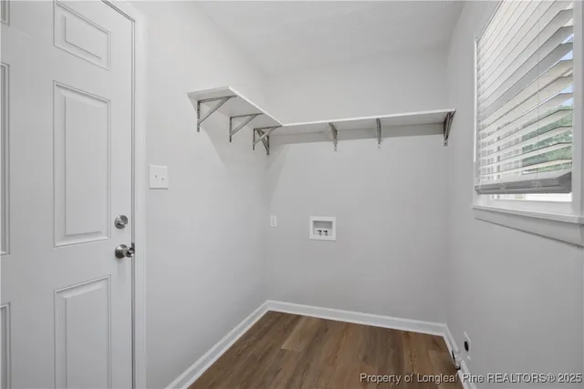 a view of small space with racks on the wall