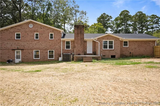 a front of a house with a yard