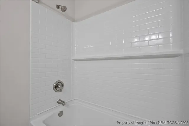 a bathroom with a tub