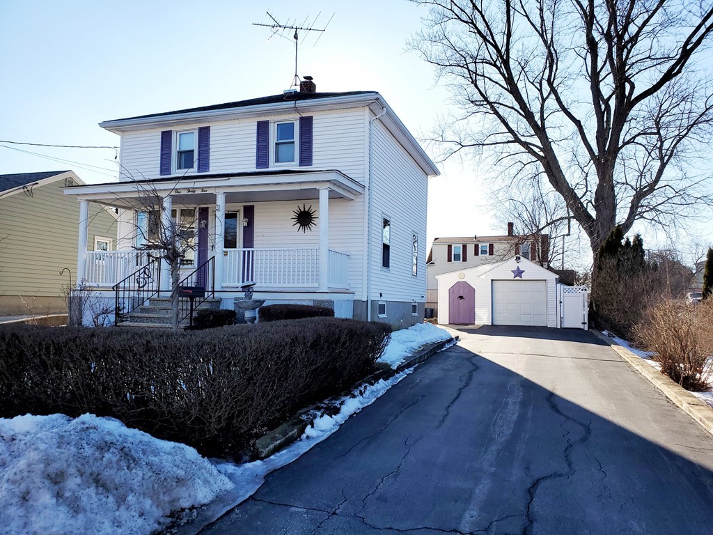 135 Knight Street Woonsocket, RI 02895 - Photo 1 of 28 a front view of a house with a yard