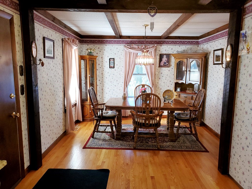 135 Knight Street Woonsocket, RI 02895 - Photo 11 of 28 a view of a dining room with furniture and wooden floor