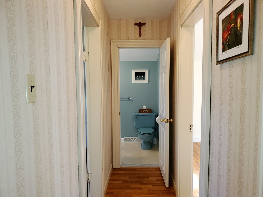 135 Knight Street Woonsocket, RI 02895 - Photo 17 of 28 a view of a hallway with a livingroom and a bathroom