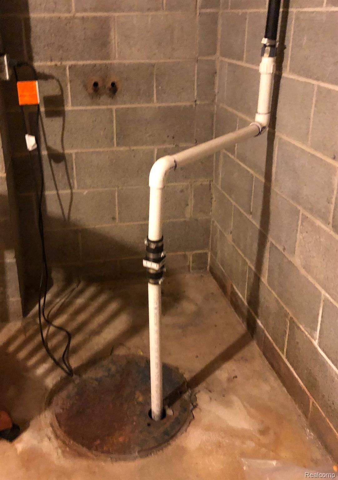 5975 Ludwig Road Oxford, MI 48371 - Photo 68 of 73 Sump pump