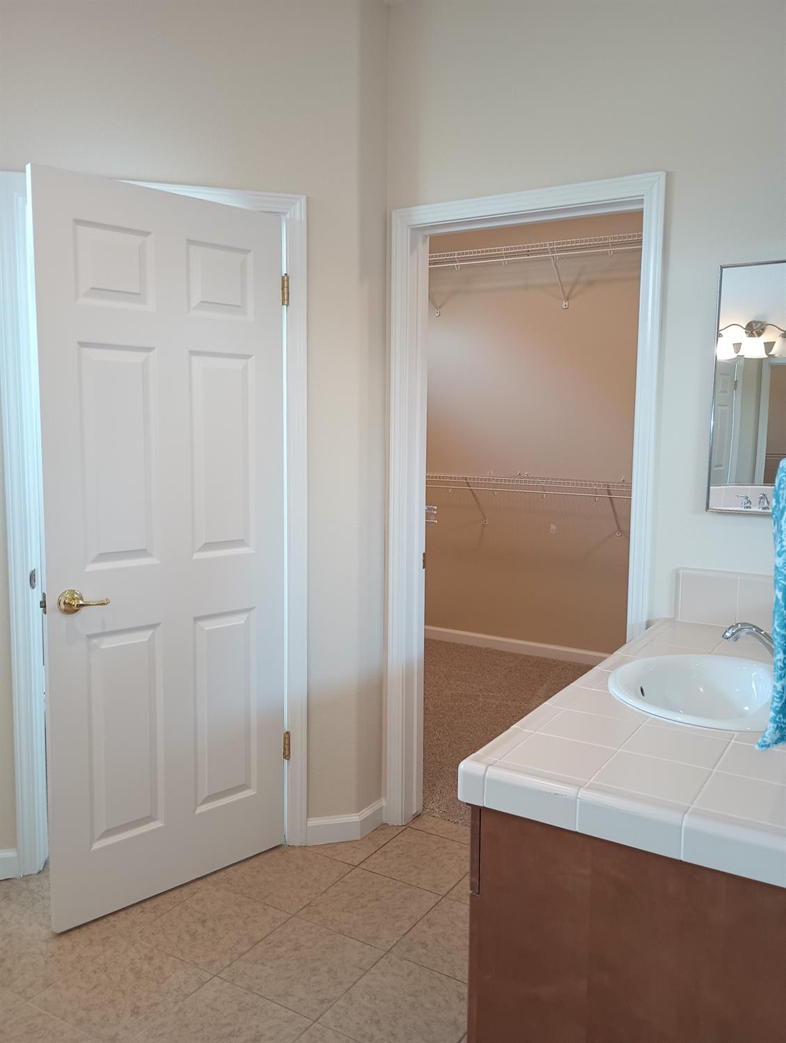 2979 Duncan Avenue Clovis, CA 93611 - Photo 18 of 27 a bathroom with a sink
