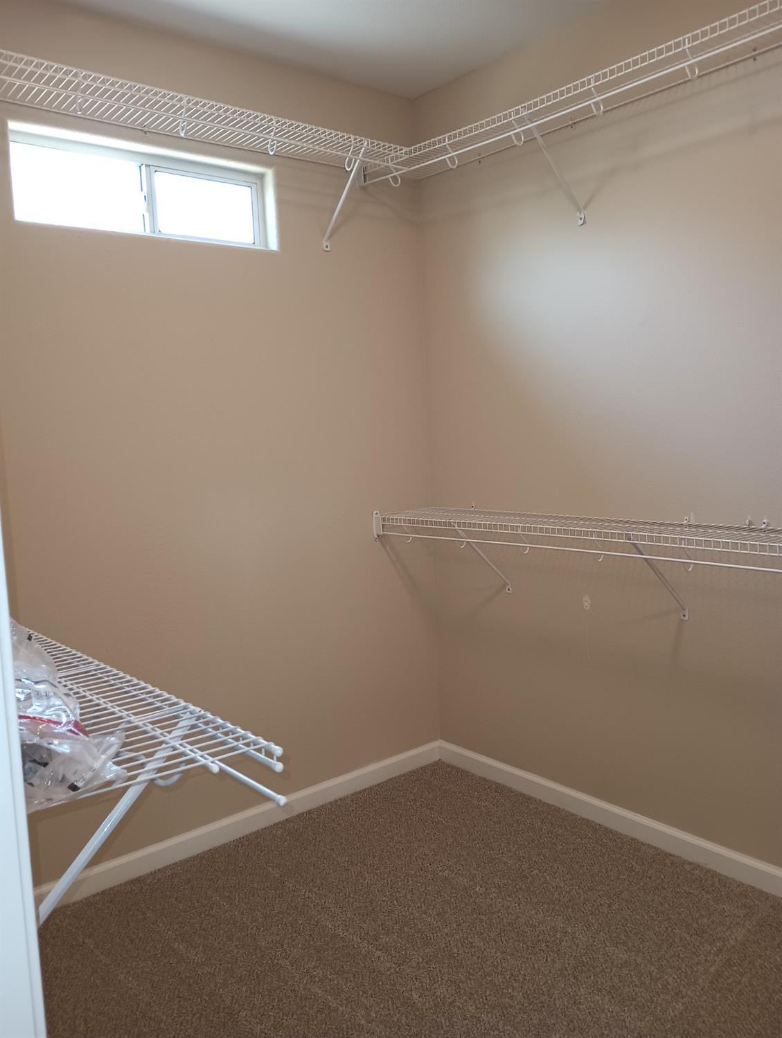 2979 Duncan Avenue Clovis, CA 93611 - Photo 19 of 27 a view of a room with racks on the wall