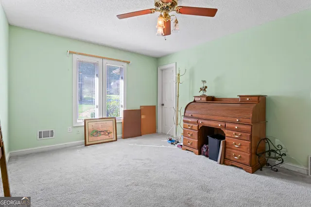 a room with furniture and a fireplace