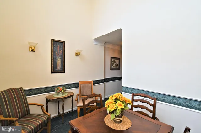 a view of a livingroom with furniture and windows