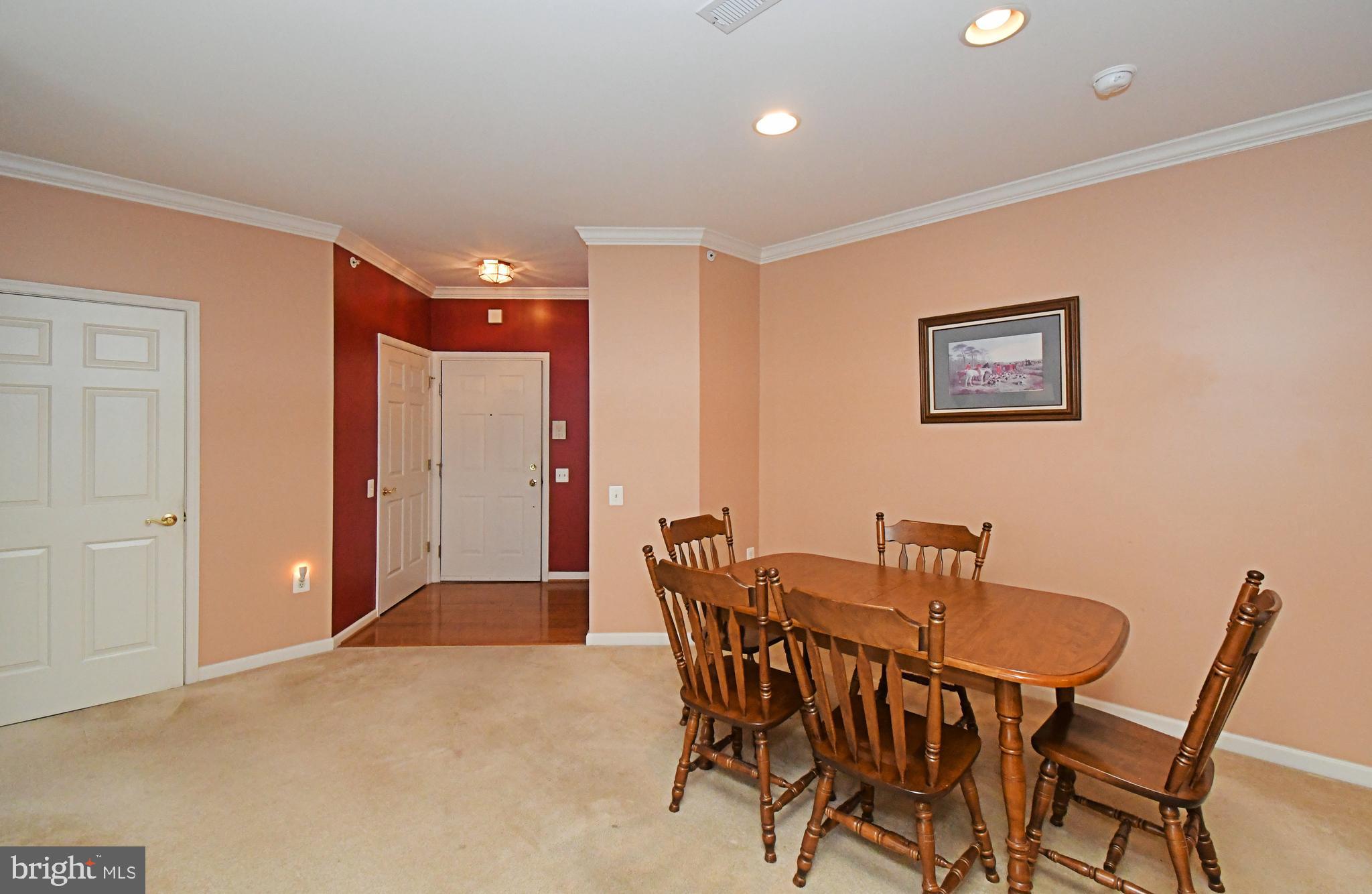 100 Ginko Street, Unit 202 Warrington, PA 18976 - Photo 17 of 53 a view of a dining room with furniture