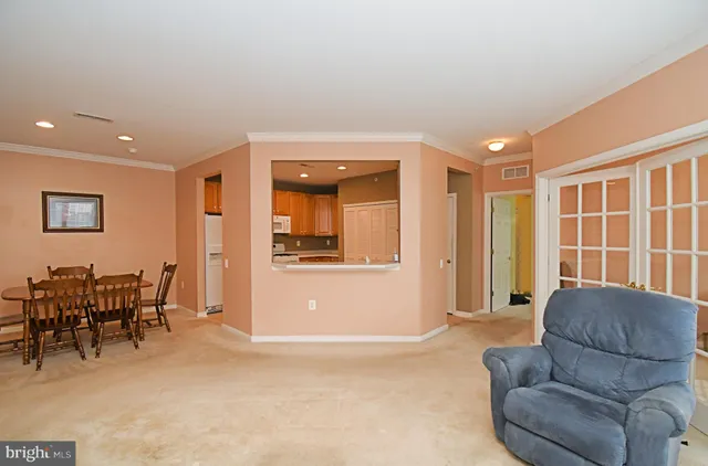 a kitchen with stainless steel appliances granite countertop a cabinets and a stove top oven