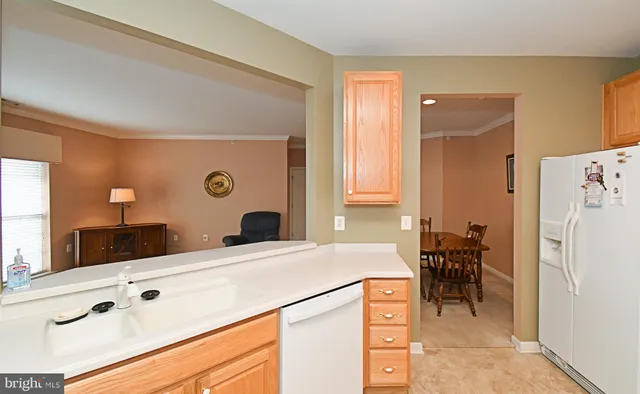a bathroom with a sink double vanity and a mirror