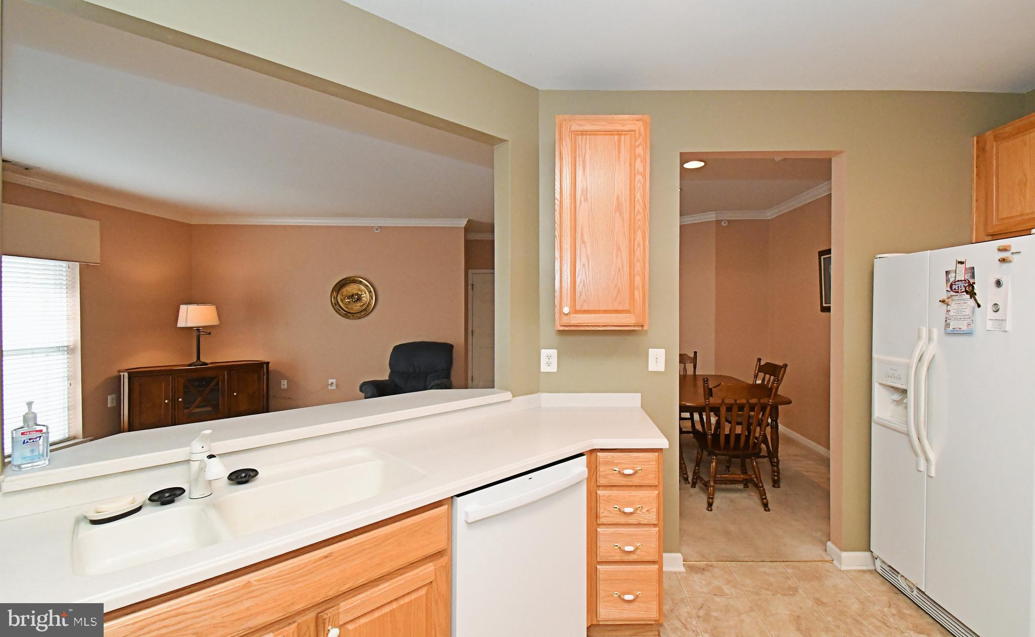 100 Ginko Street, Unit 202 Warrington, PA 18976 - Photo 27 of 53 a spacious bathroom with a double vanity sink a mirror and a bathtub