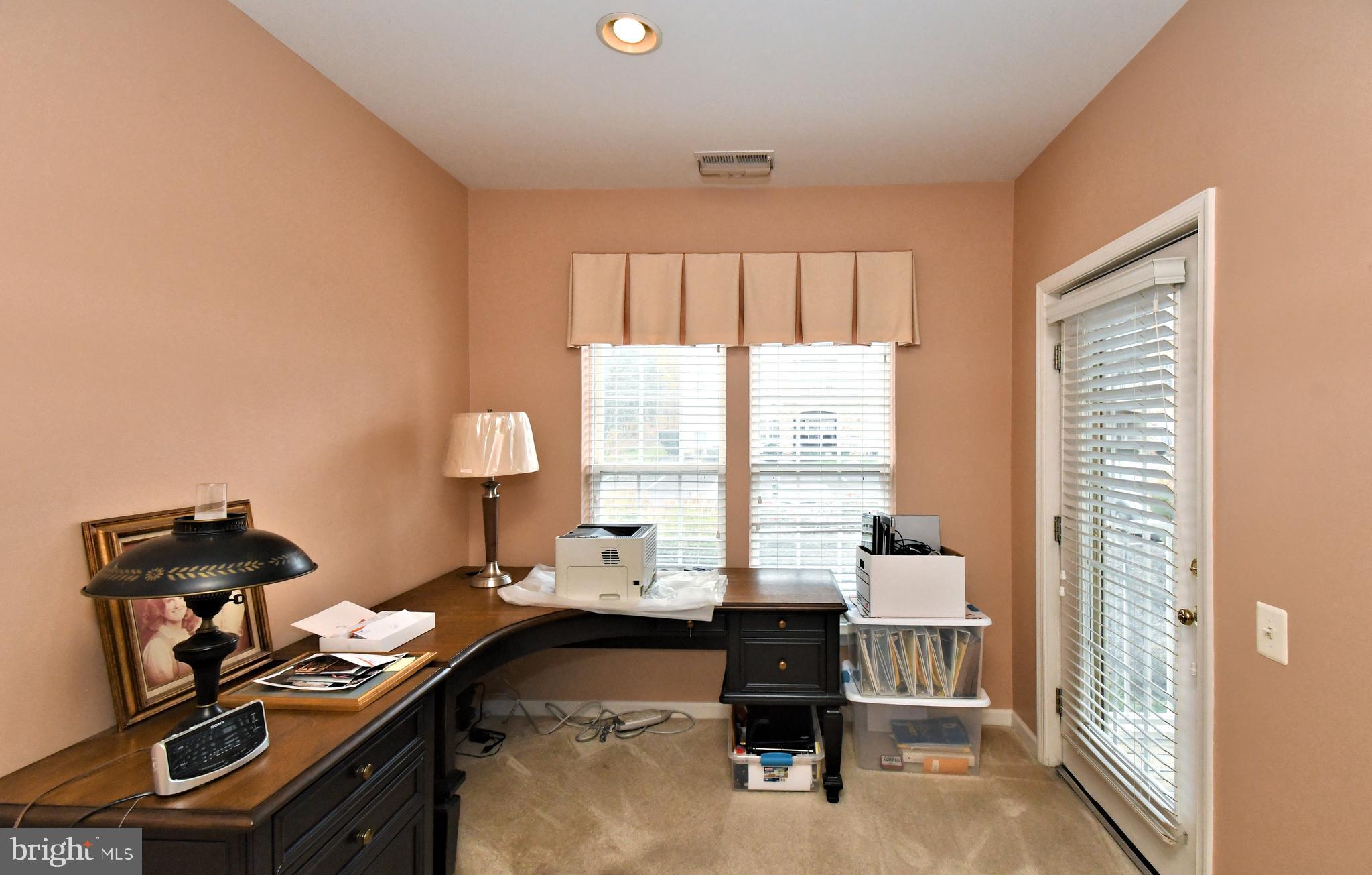 100 Ginko Street, Unit 202 Warrington, PA 18976 - Photo 34 of 53 a workspace with furniture and a window