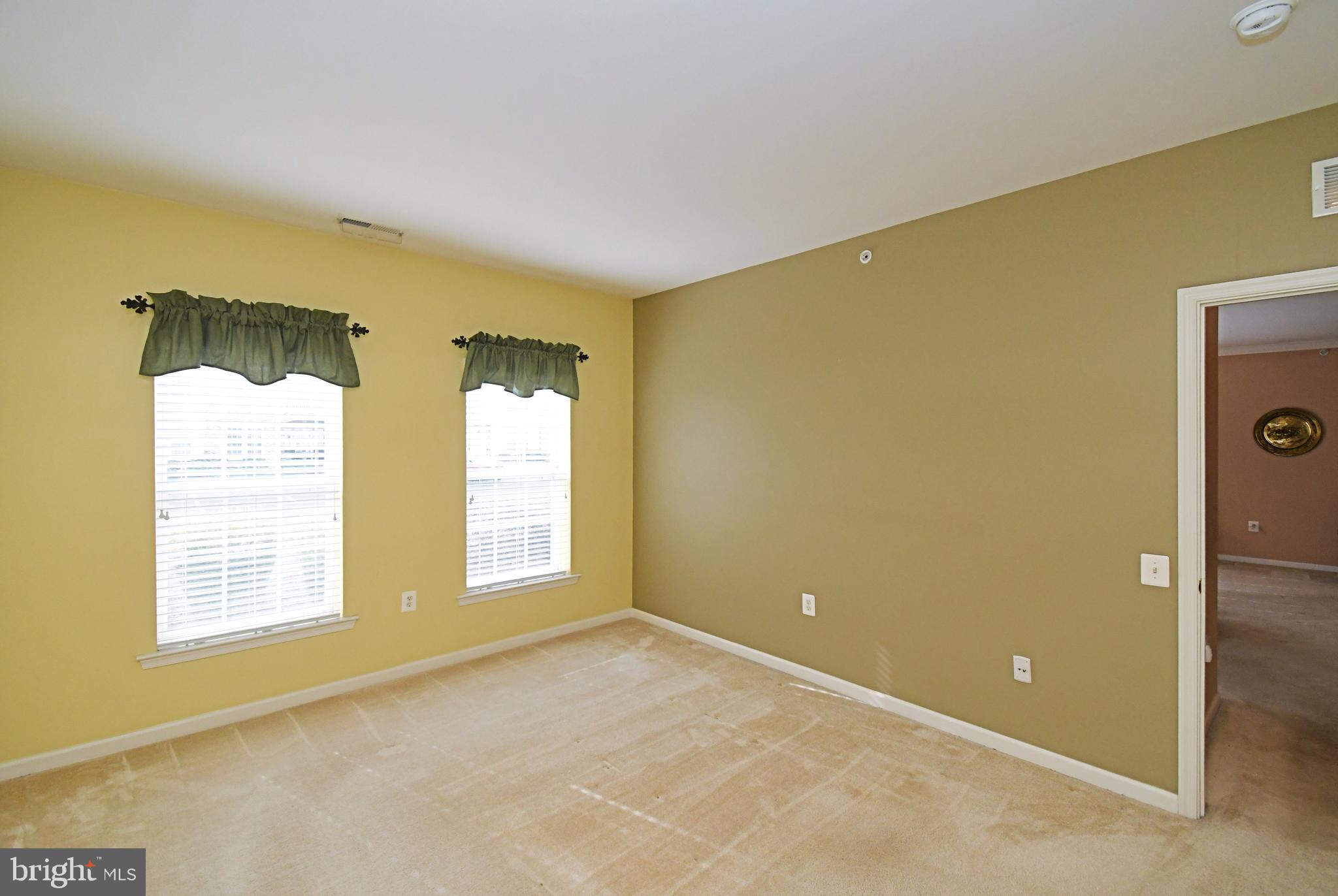 100 Ginko Street, Unit 202 Warrington, PA 18976 - Photo 38 of 53 a view of an empty room with a window