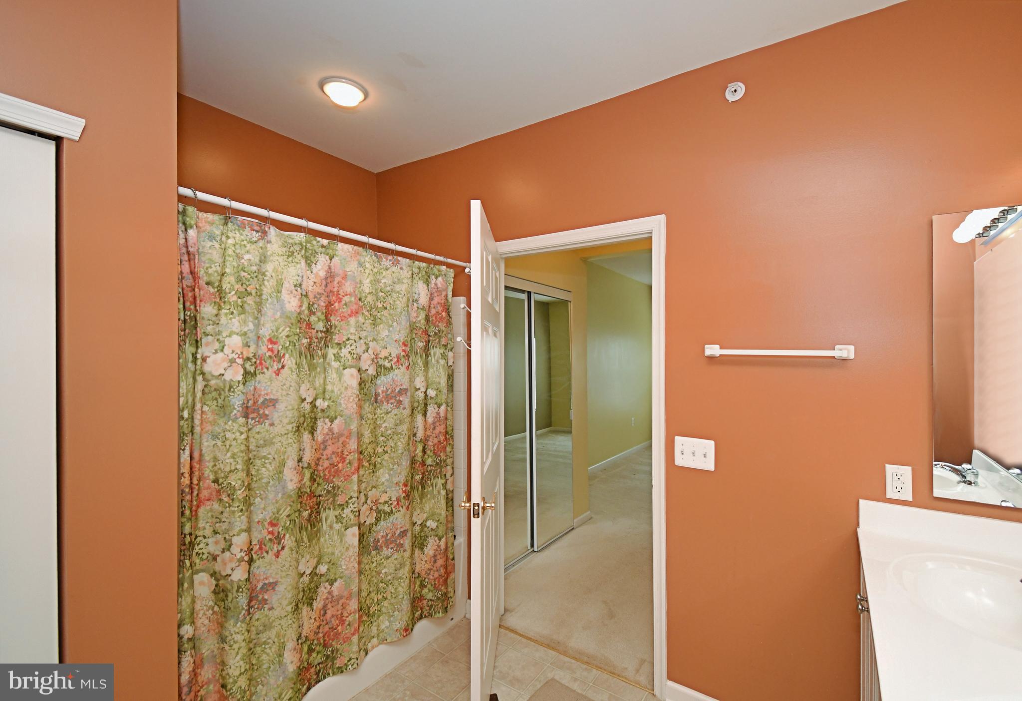 100 Ginko Street, Unit 202 Warrington, PA 18976 - Photo 42 of 53 a bathroom with a shower and a sink