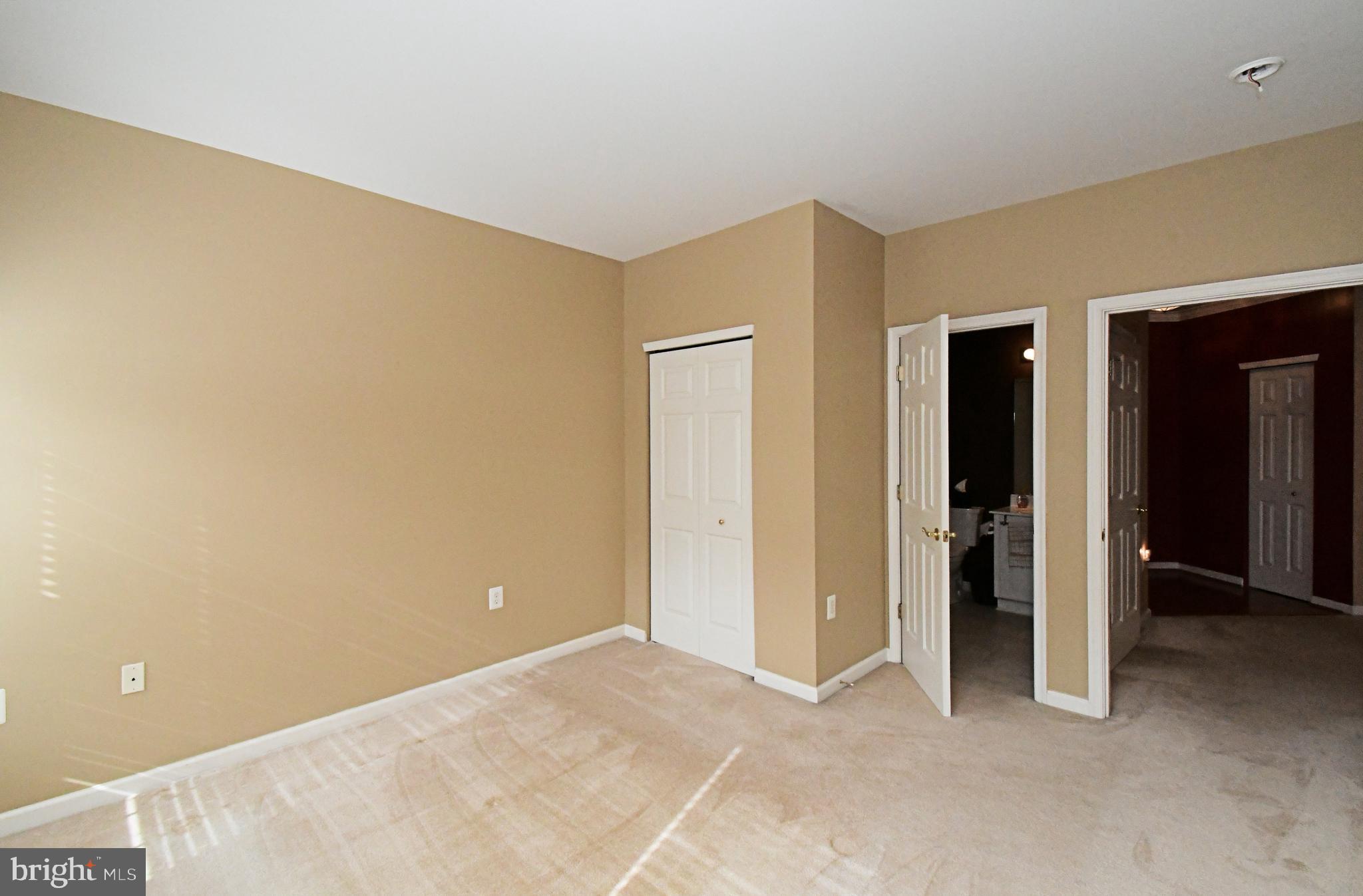 100 Ginko Street, Unit 202 Warrington, PA 18976 - Photo 44 of 53 a view of an empty room with closet