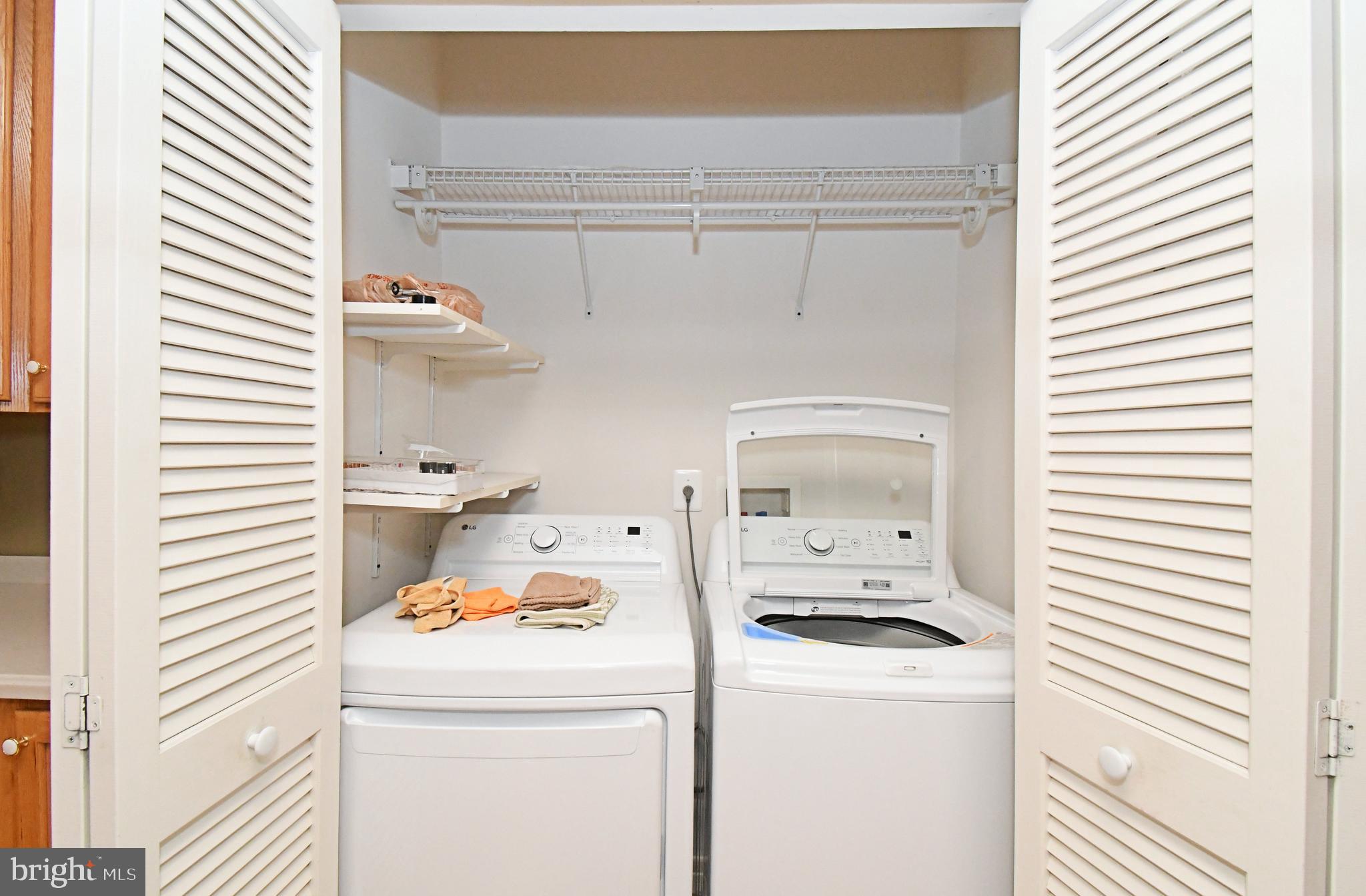100 Ginko Street, Unit 202 Warrington, PA 18976 - Photo 49 of 53 a utility room with dryer and washer