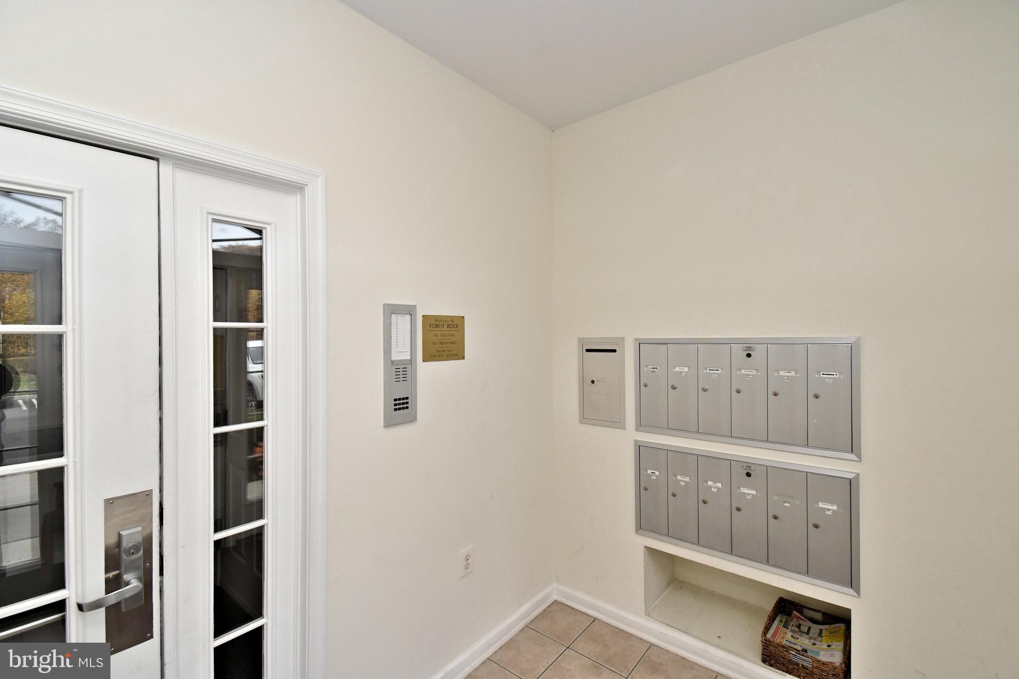 100 Ginko Street, Unit 202 Warrington, PA 18976 - Photo 7 of 53 a bathroom with a double vanity sink and a mirror
