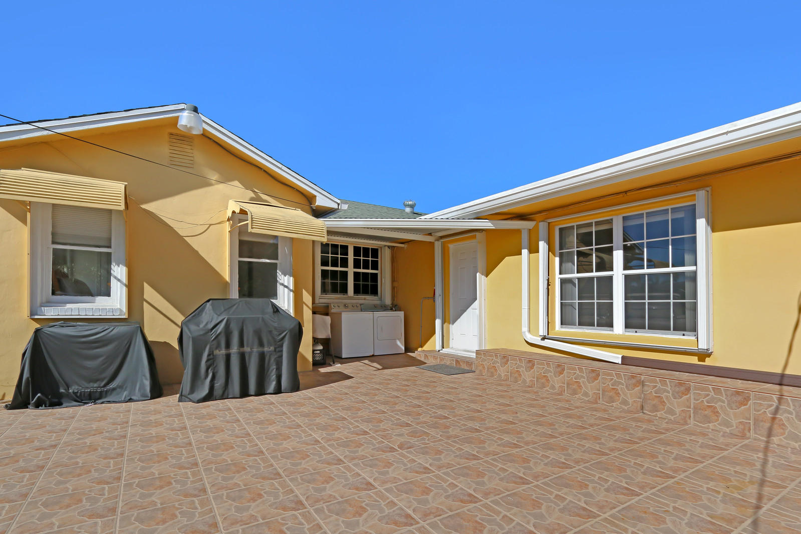 4212 Coconut Road Lake Worth, FL 33461 - Photo 19 of 20 Rear Porch/Washer Dryer