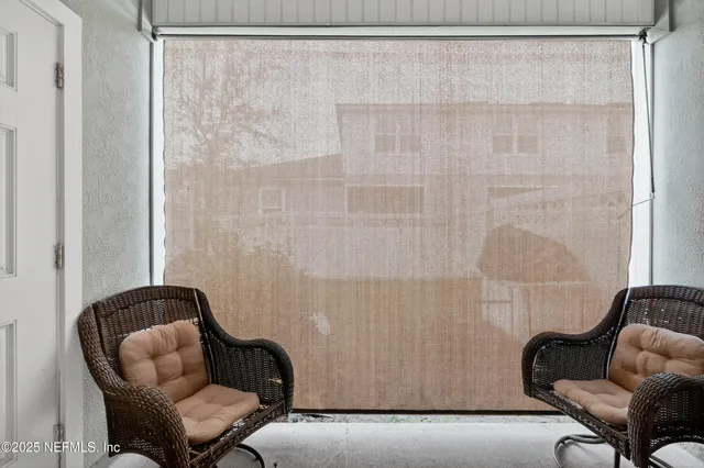a living room with furniture and a couch