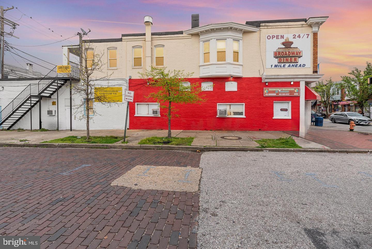 4600 Eastern Avenue Baltimore, MD 21224 - Photo 1 of 25 a front view of building with yard
