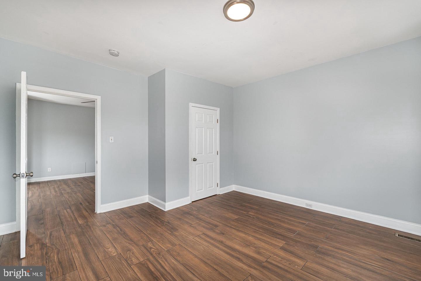 4600 Eastern Avenue Baltimore, MD 21224 - Photo 15 of 25 a view of a room with wooden floor