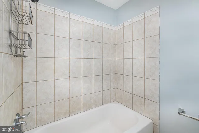 a bathroom with a bathtub