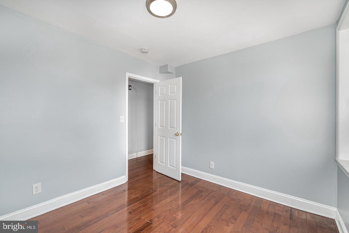 4600 Eastern Avenue Baltimore, MD 21224 - Photo 19 of 25 a view of an empty room with wooden floor