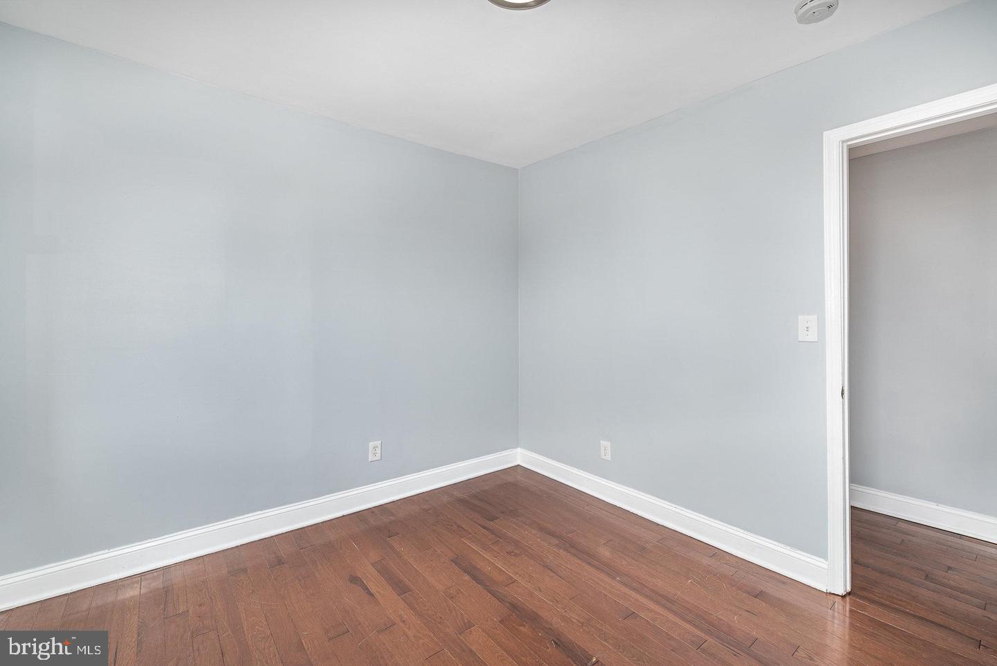 4600 Eastern Avenue Baltimore, MD 21224 - Photo 22 of 25 a view of an empty room with wooden floor