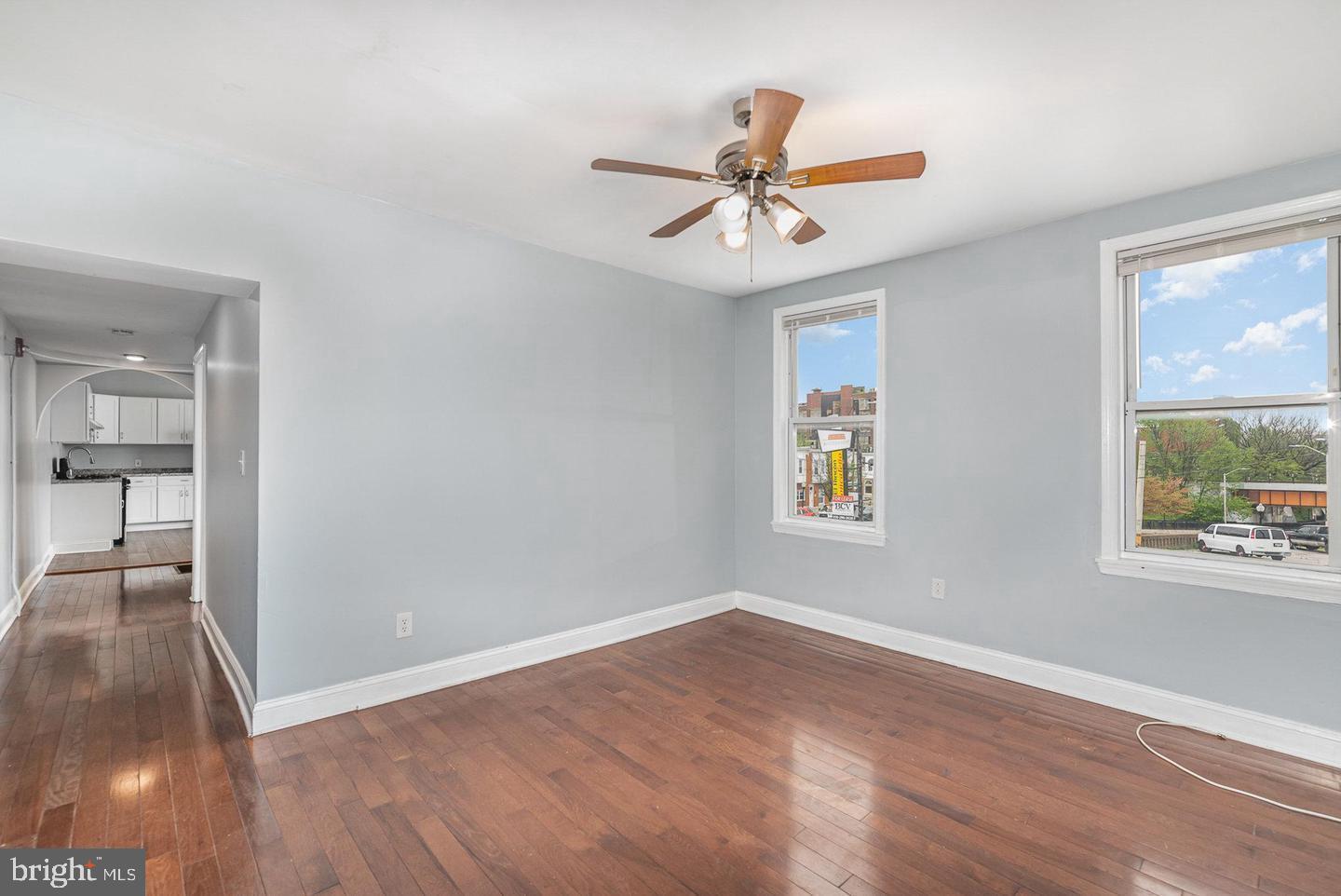 4600 Eastern Avenue Baltimore, MD 21224 - Photo 5 of 25 wooden floor in an empty room with a window