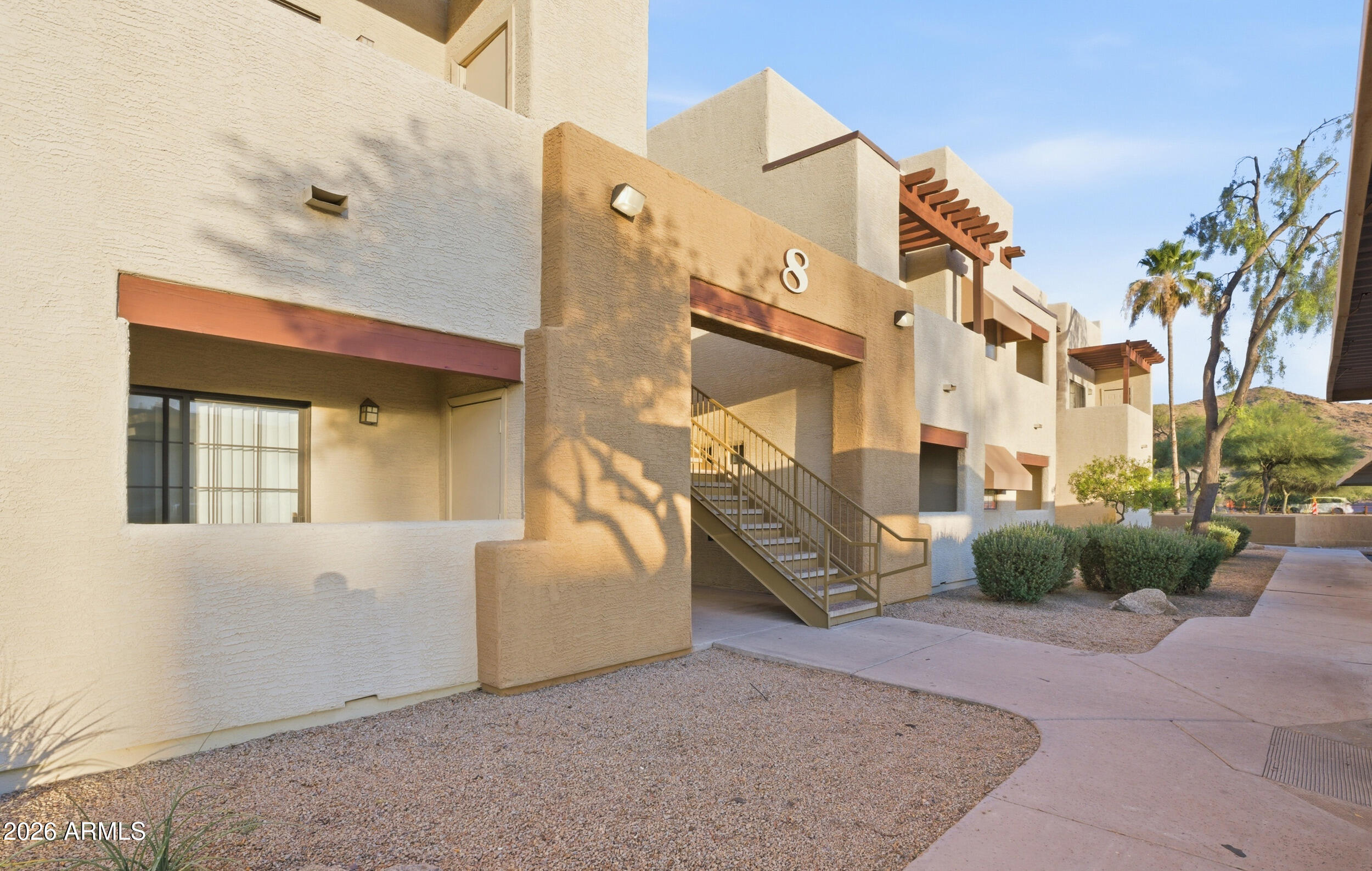 a view of a building with couches