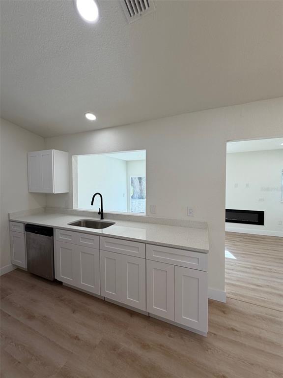 5342 Broken Pine Circle Orlando, FL 32818 - Photo 5 of 15 a kitchen with sink and cabinets