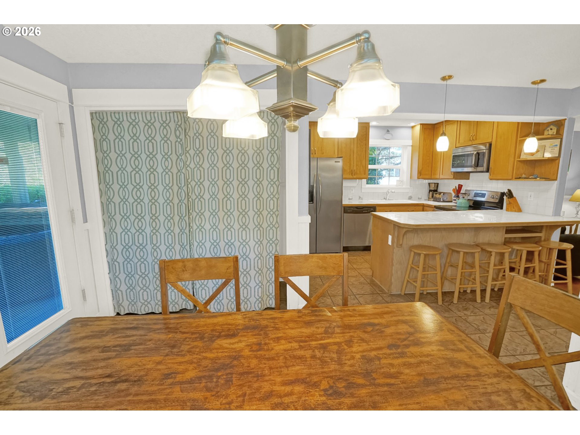 265 Bunchberry Way Depoe Bay, OR 97341 - Photo 19 of 48 a view of a kitchen and dining area