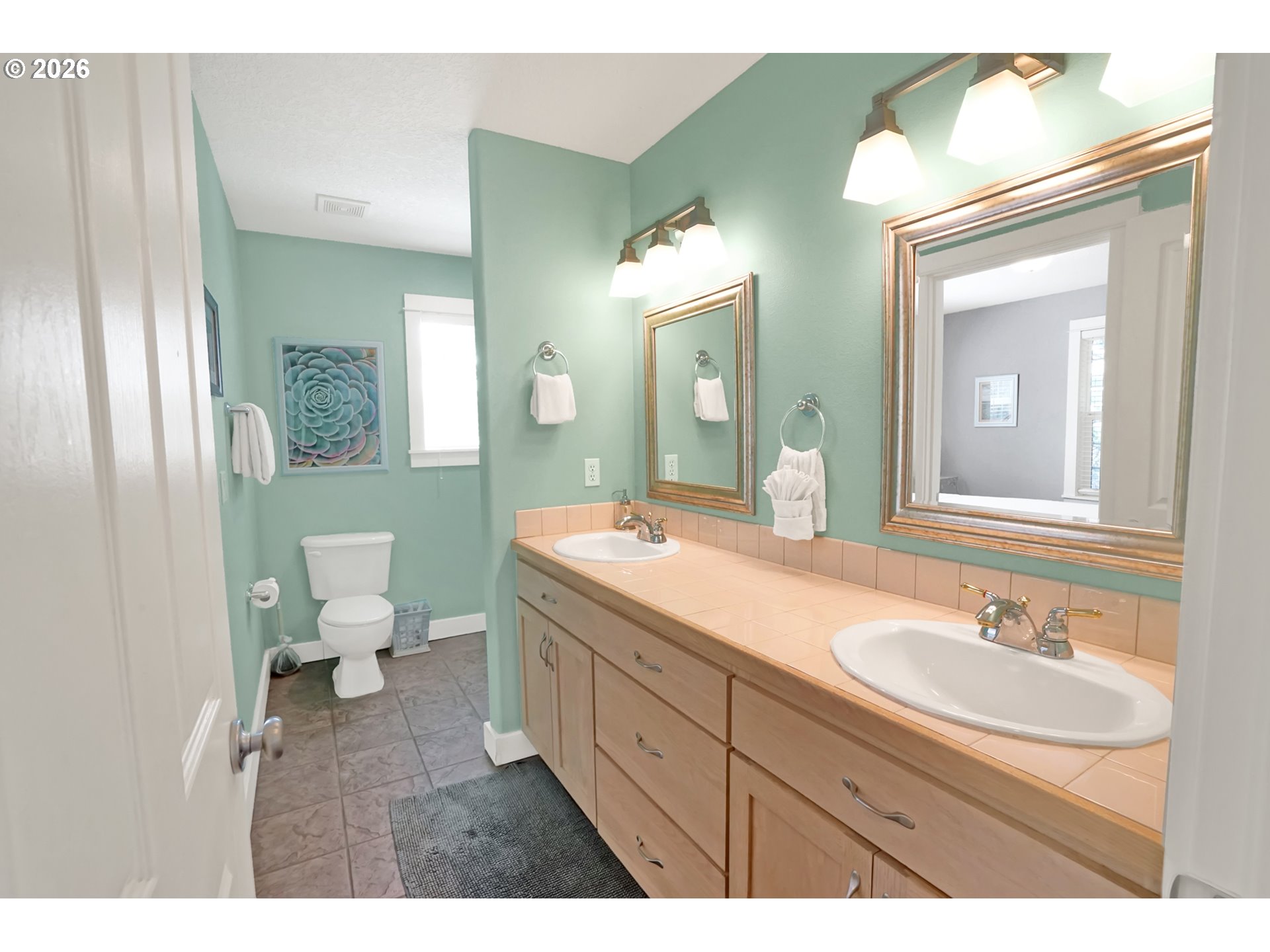 265 Bunchberry Way Depoe Bay, OR 97341 - Photo 26 of 48 a bathroom with a sink and a mirror