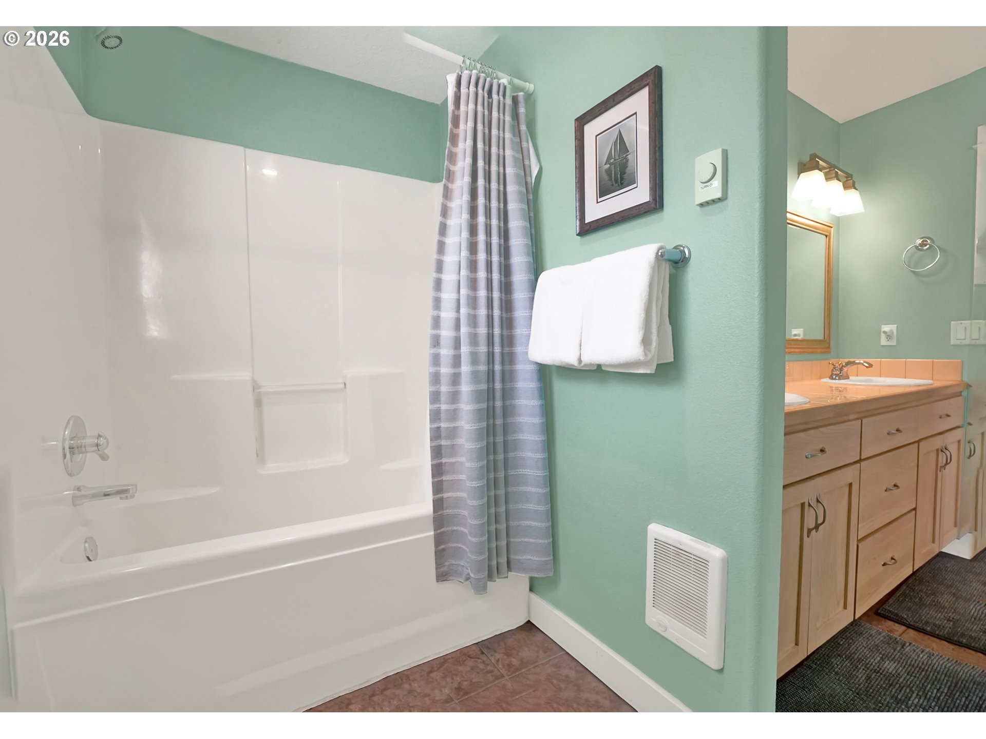 265 Bunchberry Way Depoe Bay, OR 97341 - Photo 27 of 48 a bathroom with a bathtub sink and mirror
